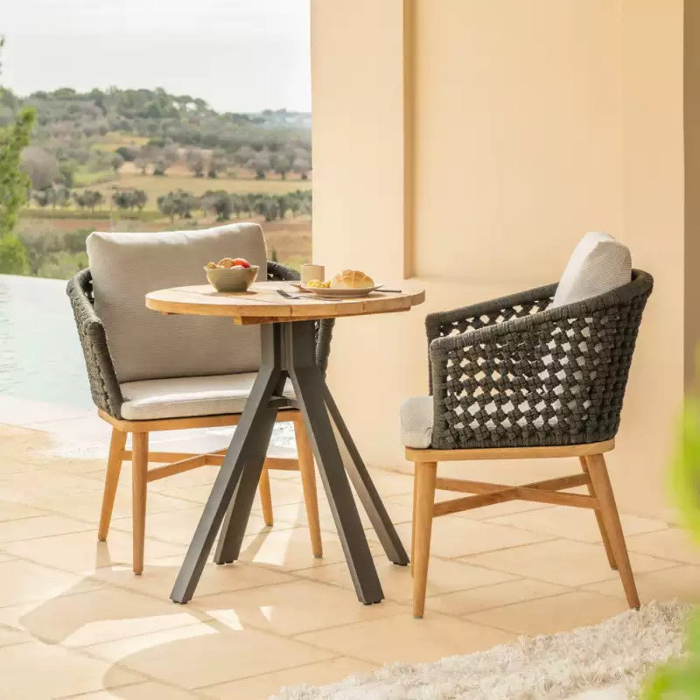 Cozy Bistro Set with Woven Chairs and Wooden Table