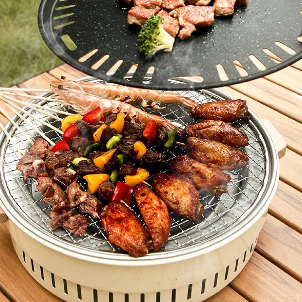 Portable Charcoal Grill with Dual Cooking Surfaces